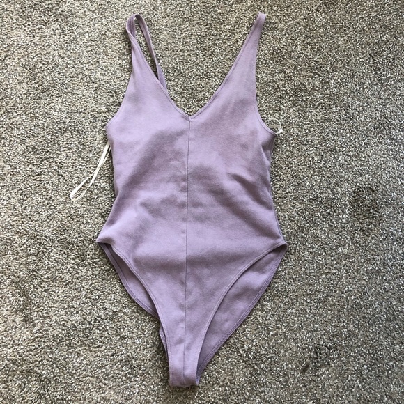 Urban Outfitters Tops - URBAN PURPLE BODY SUIT